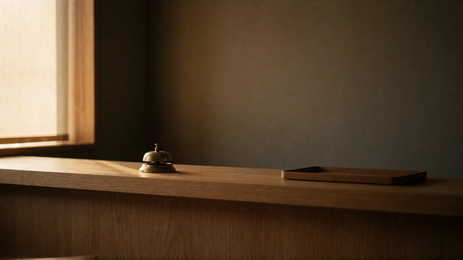 A counter in a small office, empty, with blank paper on it